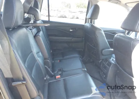 2016 Honda Pilot Touring z USA, uszkodzony, nr VIN 5FNYF6H91GB052613